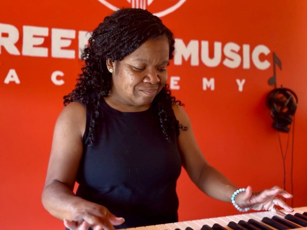 Adult Piano Lessons for Beginners in Johnson City at Freedom Music Academy Adult learning piano at music lessons in Johnson City